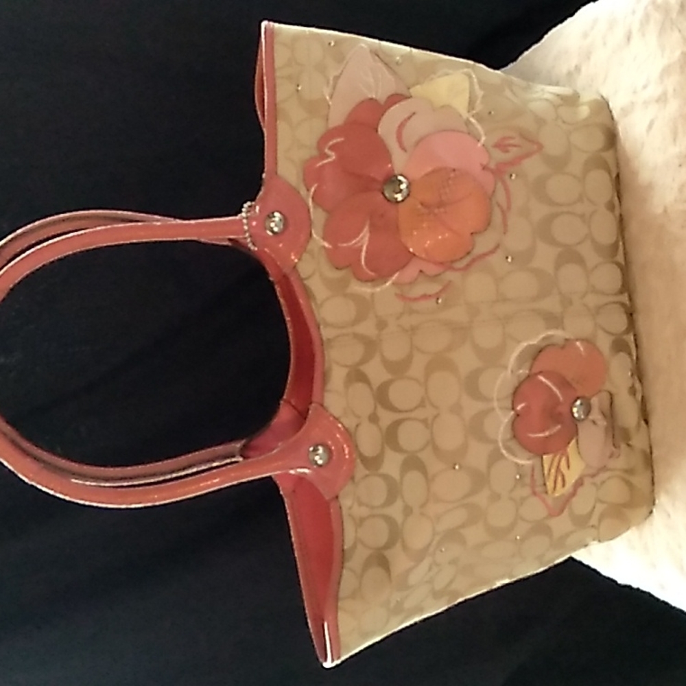 Unique Coach handbag with coral accents in patent and suede